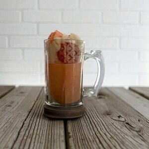 pumpkin and waffle accents adorn with pumpkin scent 32 oz candle